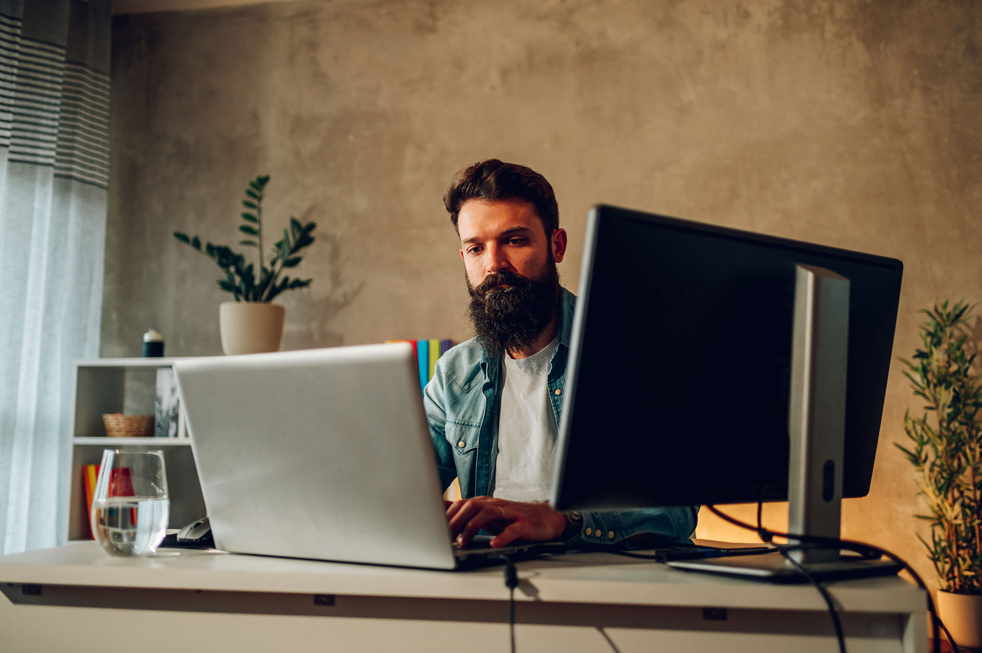 a young ai and it specialist is sitting at the hom 2023 11 27 05 22 54 utc